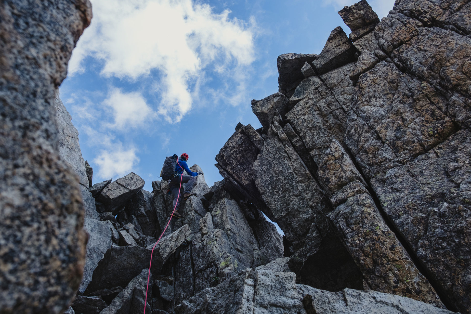 climber looking up on rock